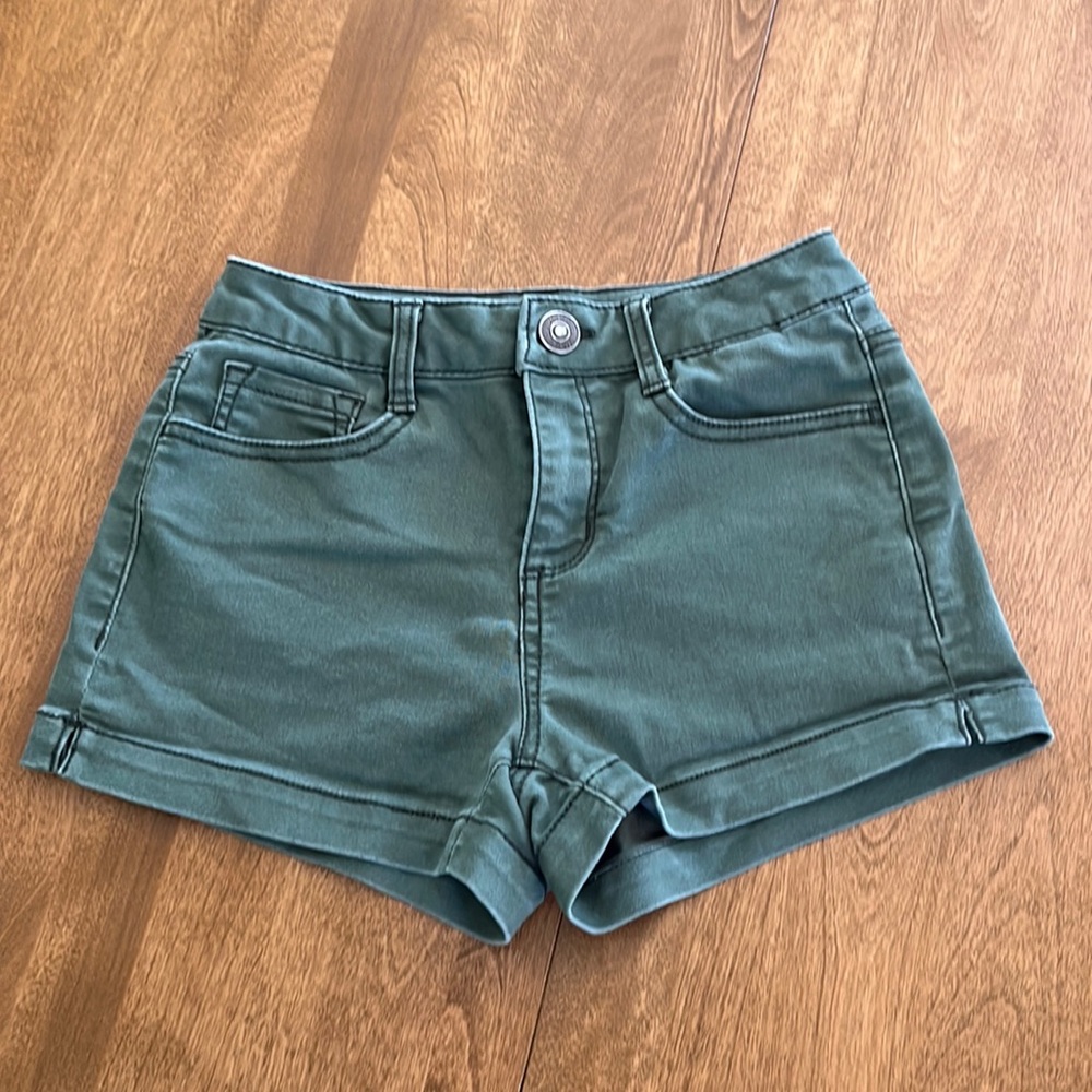 Green shorts size 3 gently worn. No stains or rips.